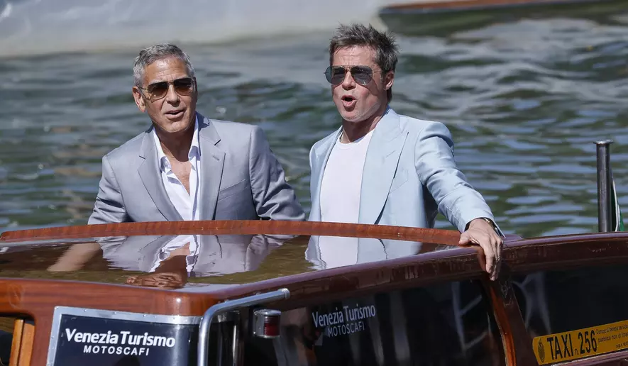 “Pitt and Clooney are in town for the Venice Film Festival with their new movie Wolfs”