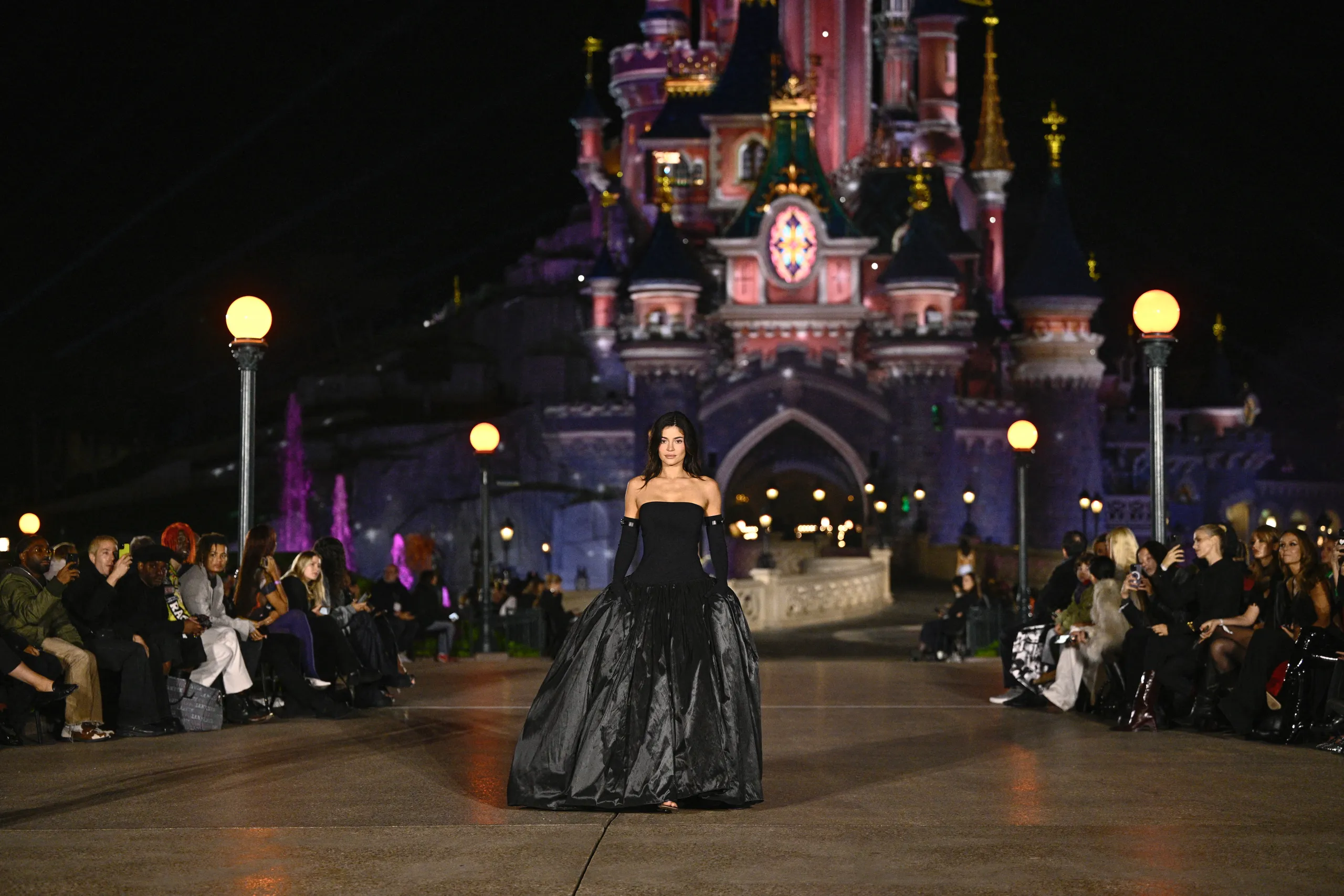 “Kylie Jenner makes an uncommon runway appearance at the Disneyland Paris Coperni show.”